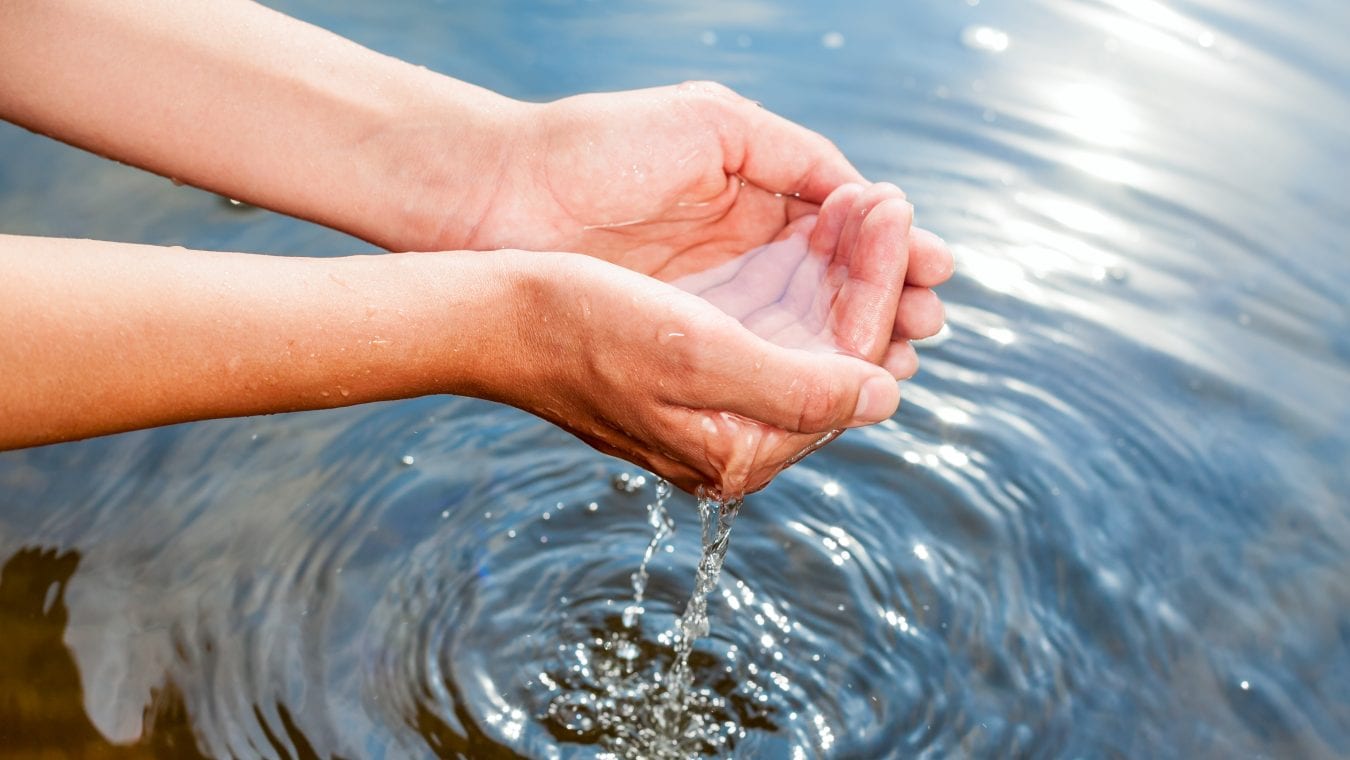 Holding water in cupped hands